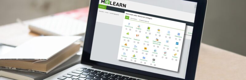 Laptop mit Auswahlfenster für Arbeitsmaterialien